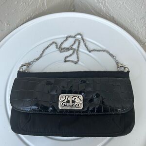 Brighton black nylon and faux patent leather crossbody bag.